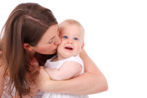 mother-kissing-baby